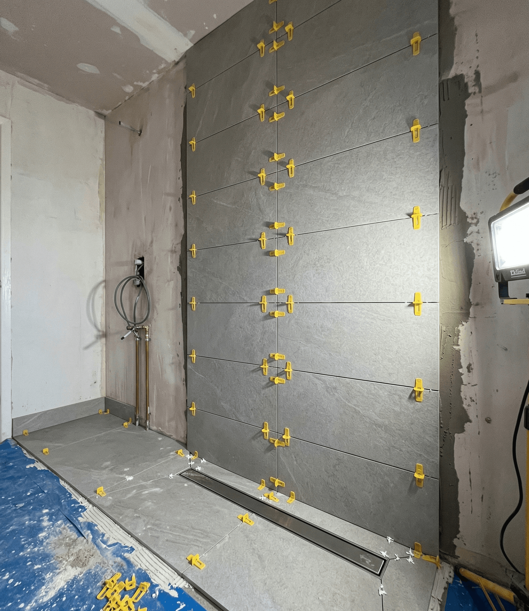 Fully refurbished bathroom with underfloor heating installed by Ryan Heating & Building in a Southall home